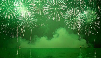 Spectacular Green Fireworks Display Over Water at Night Celebration
