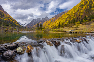 Siguniang Mountains (Four Girls Mountain) is a famous tourist attraction in Sichuan, China, It features mountains, pine forest streams and wild animals and has been certified as a 5A level 
