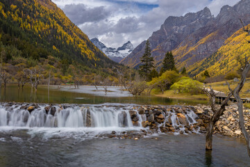 Siguniang Mountains (Four Girls Mountain) is a famous tourist attraction in Sichuan, China, It features mountains, pine forest streams and wild animals and has been certified as a 5A level 