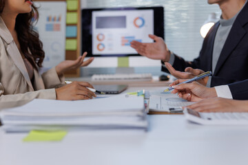 Business people discussing financial data during office meeting