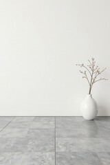 Minimalist Interior Design Simple Elegance with a Dried Branch Arrangement in a White Vase Against a Clean White Wall and Grey Floor