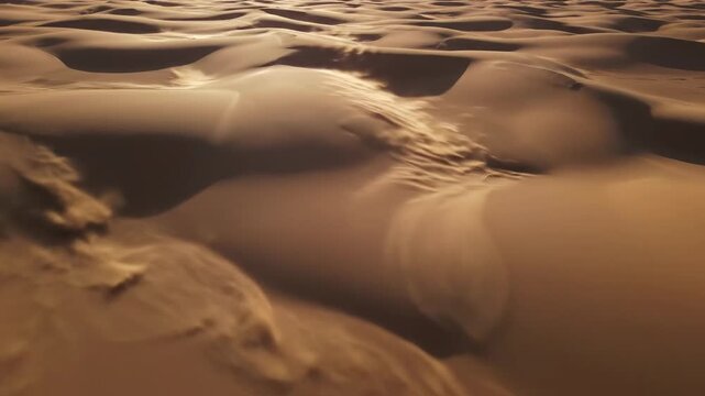 Top-down aerial view of subtle tan and brown layered sand dunes subtly vibrating and shifting in resonant patterns across a vast desert motion, organic, environmental