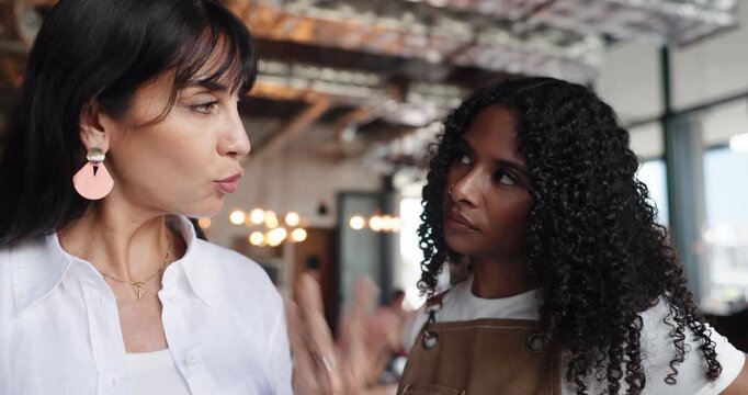 Manager, restaurant and team with tablet for discussion, inventory or training. Waitress, women and technology in small business for menu planning, hospitality and coaching with owner for stock order