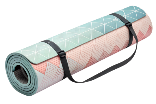 Rolled yoga mat with geometric pattern and carrying strap against a