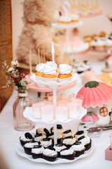 Candy bar of different cookies, candy and sweets at party