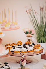 Candy bar of different cookies, candy and sweets at party