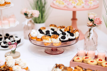 Candy bar of different cookies, candy and sweets at party