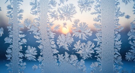 Obraz premium Detailed frost patterns on a windowpane against a blurry winter sunrise background