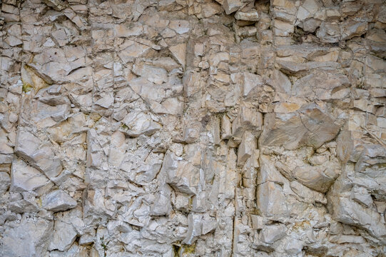 Sedimentary white rock soil, composed of chalk, marl and limestone, on champagne vineyards in village Hautvillers in Marne valley, Champange, France, soil sample, nature soil background