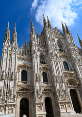 Fototapeta premium Views of central part of Milan, Brera district, shopping area, church Duomo, architectural details, streets, walking in Milan, Lombardy, Italy