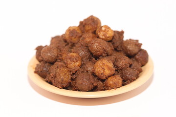 Potato rendang served on a plate, Rendang is a typical Padang food. With a white background