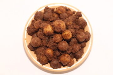 Potato rendang served on a plate, Rendang is a typical Padang food. With a white background