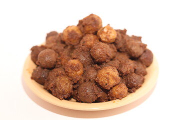 Potato rendang served on a plate, Rendang is a typical Padang food. With a white background