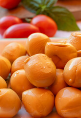 Cheese collection, smoked yellow italian mini scamorza or scamorzella cheese