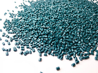 Obraz premium plastic masterbatch, green masterbatch granules as virgin polymer resin pigment, poured into white background media, suitable for industrial plastic company profile product catalog design, top view