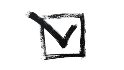 Hand-drawn, black checkmark inside a chalk-like square on a dark background