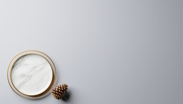 Elegant marble plate with gold rim and pinecone, perfect for showcasing food photography or holiday table setting mockups with a touch of festive sophistication