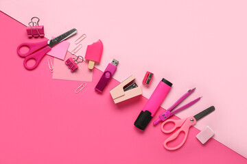 Composition with stationery and modern flash drive on pink background