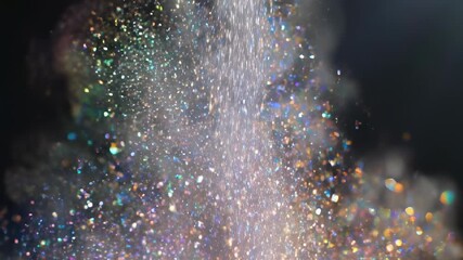 Slow motion macro shot of fine iridescent dust particles falling and scattering with vibrant chromatic dispersion cosmic, blank, colorful - Powered by Adobe