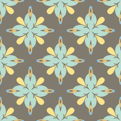 Yellow and green damask seamless pattern with decorative flowers.  Ikat pattern floral background.  Vintage-style fabrics, rugs, tiles, wallpapers, and textiles. Retro vintage-style fabrics.