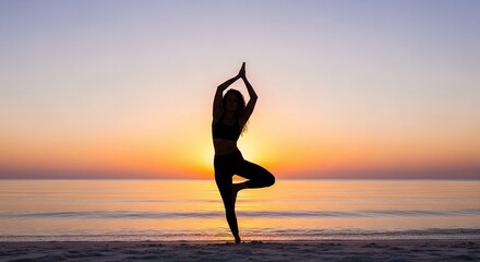Silhouette of a Woman Practicing Tree Pose (Vrikshasana) Yoga on the Beach at Sunset