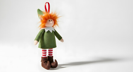Festive Christmas Elf Ornament with Red Hair and Striped Stockings on White Background