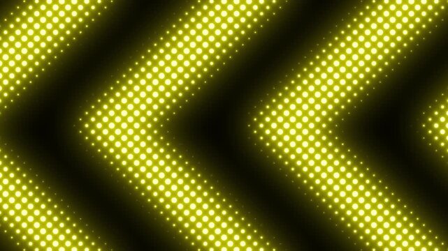 Seamless pattern of glowing yellow led lights forming chevron or arrow shapes against a dark background 4k video