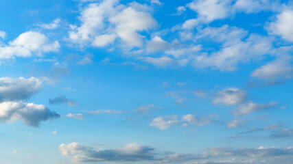 Beautiful blue sky with soft white clouds at dawn for an abstract background