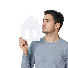 man holding white house cutout on white background.