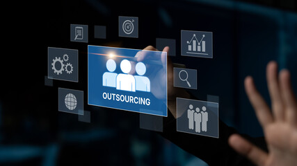 Outsourcing concept showing collaboration, delegation, global workforce, productivity, and task management through remote teams and external service providers Latch