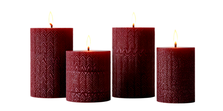 Four burgundy candles with lit wicks isolated on transparent background