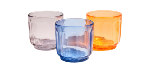 Three colorful glass tumblers isolated on transparent background