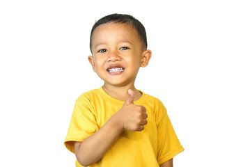 Cheerful Asian little boy giving thumbs up, expressing positive emotions, okay, cool, agree, with his charming smile, isolated on white background