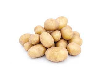 Heap of raw baby potatoes on white background
