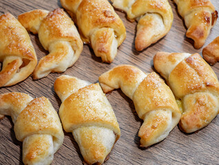 Crescent rolls filled plum jam, from yeast dough