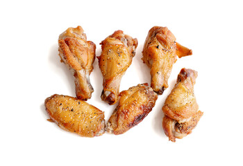Grilled chicken wings on a white background.