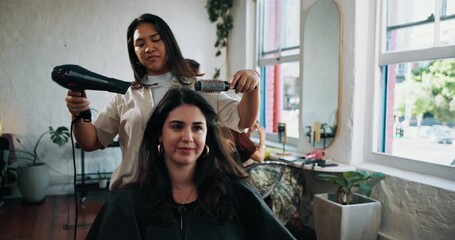 Woman, brush and hairdryer with grooming at salon, services and treatment with service at shop. People, appliance and equipment for hairdresser, stylist or appointment for makeover at beauty parlor