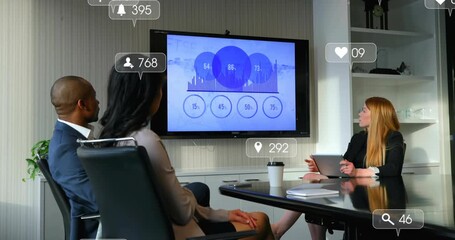 Business presenter tapping tablet and pointing during meeting shifting circles to bars icons rising - Powered by Adobe