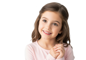 A young girl with long brown hair smiling at the viewer, clasp, eye, girl, hair, hand, jaw, pink, portrait, pose, shirt, smile, white 
