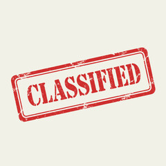 A red rectangular rubber stamp with the word "CLASSIFIED" on a light beige background, indicating restricted information.