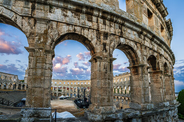 The Roman Amphitheatre in Pula (Pula Arena) in Istria region of Croatia early in morning sunrise...