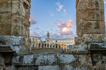 The Roman Amphitheatre in Pula (Pula Arena) in Istria region of Croatia early in morning sunrise...