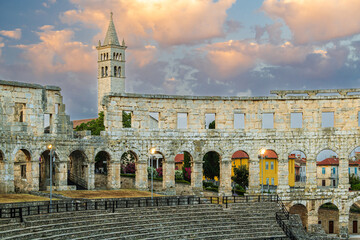 The Roman Amphitheatre in Pula (Pula Arena) in Istria region of Croatia early in morning sunrise...