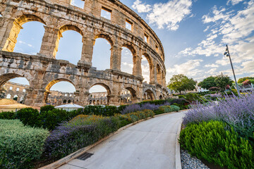 The Roman Amphitheatre in Pula (Pula Arena) in Istria region of Croatia early in morning sunrise...