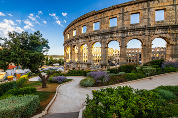The Roman Amphitheatre in Pula (Pula Arena) in Istria region of Croatia early in morning sunrise...