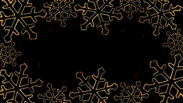 Merry Christmas xmas winter holiday celebration greeting card template - Abstract frame made of led snowflakes, ice crystals fairy lights ornament, isolated on black background texture