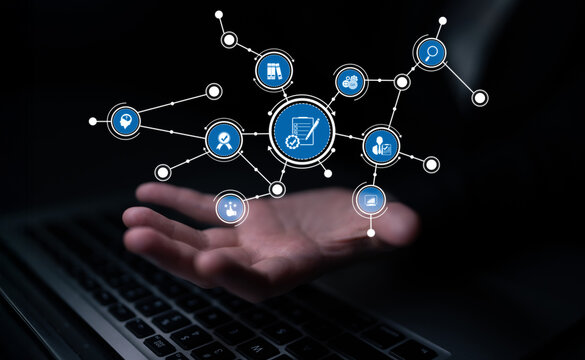 A creative representation of a hand reaching out with digital shopping icons above a laptop, highlighting the evolution of e-commerce and online shopping experiences. Tessel