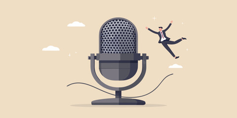 Man leaps for joy next to a vintage microphone on a light background