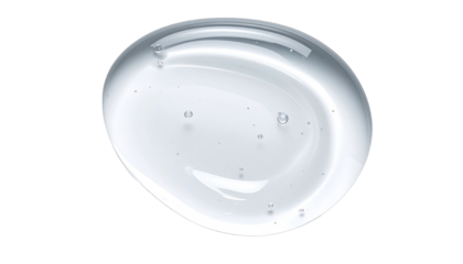 Droplet of clear, viscous liquid with small bubbles, isolated on black