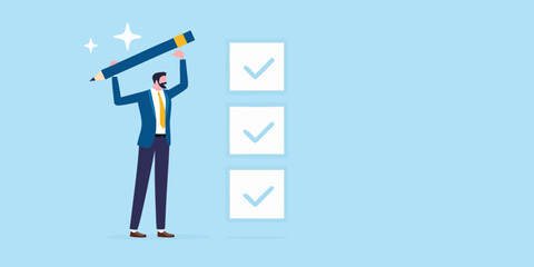 Businessman completing a checklist with a large pencil